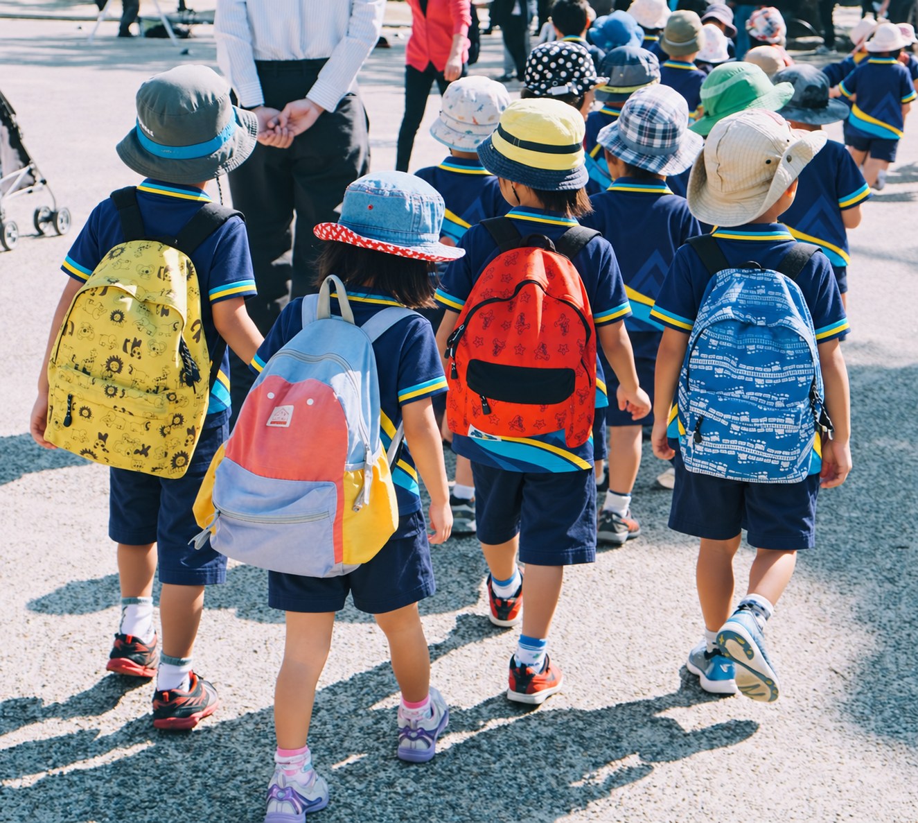 Children with backpacks walking together